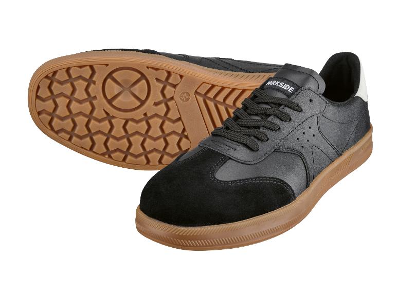 Baskets noires pour hommes avec semelle en gomme et détails en daim.