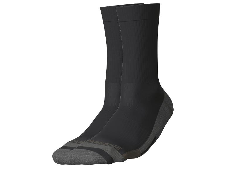Une paire de chaussettes noires Parkside avec des orteils et des talons gris.