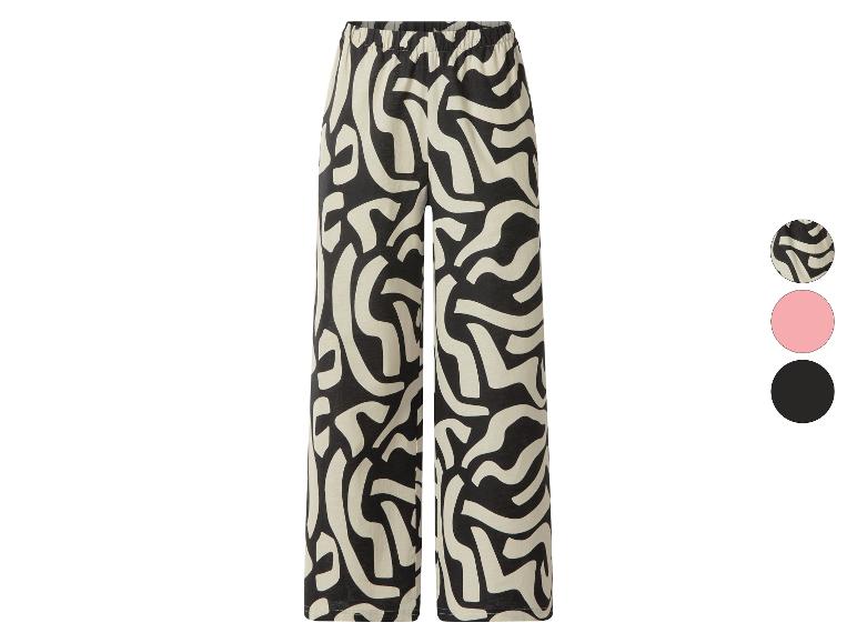 Pantalon femme à motif abstrait noir et blanc, avec taille élastique.