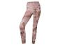 Un legging rose avec un motif abstrait.