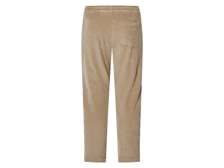 Pantalon beige en velours côtelé avec cordon.