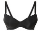 Un soutien-gorge noir avec des bonnets lisses et des bretelles larges.