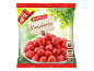 Sachet XXL de fraises congelées avec un bol de fraises et instructions de préparation.