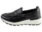Mocassins en cuir noir avec semelle blanche.