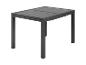 Table extensible moderne avec plateau en métal gris foncé.