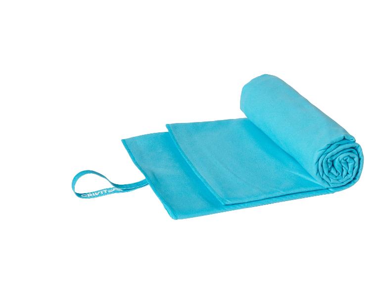 Serviette de sport Crivit turquoise, compacte et légère.