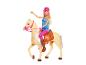 Poupée Barbie à cheval avec selle et équipement d'équitation.