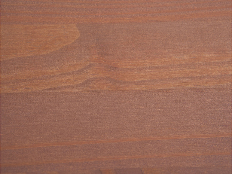 Gros plan sur une surface en bois brun.