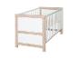 Lit bébé blanc avec cadre en bois