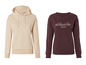 Un hoodie beige et un sweat-shirt bordeaux avec l'inscription 'New York City Manhattan Island'.