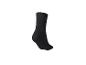 Une chaussette noire sur fond blanc