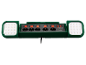 Multiprise verte avec quatre prises, interrupteurs individuels, deux ports USB et deux lampes de travail LED intégrées.