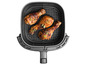 Cuisses de poulet rôties dans une friteuse à air.