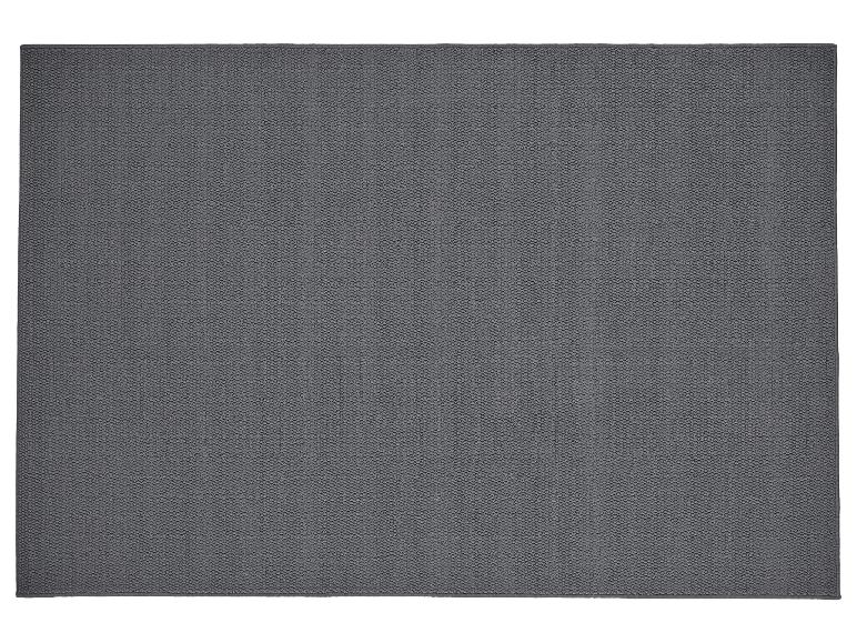 Tapis de bain rectangulaire gris foncé avec texture bouclée.