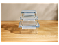 Boîtes de conservation en verre empilables avec couvercles.