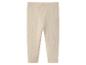Legging beige uni pour enfant, idéal pour le confort quotidien.