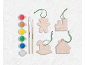 Kit d'ornements de Noël à peindre avec peintures, pinceaux et diverses formes.