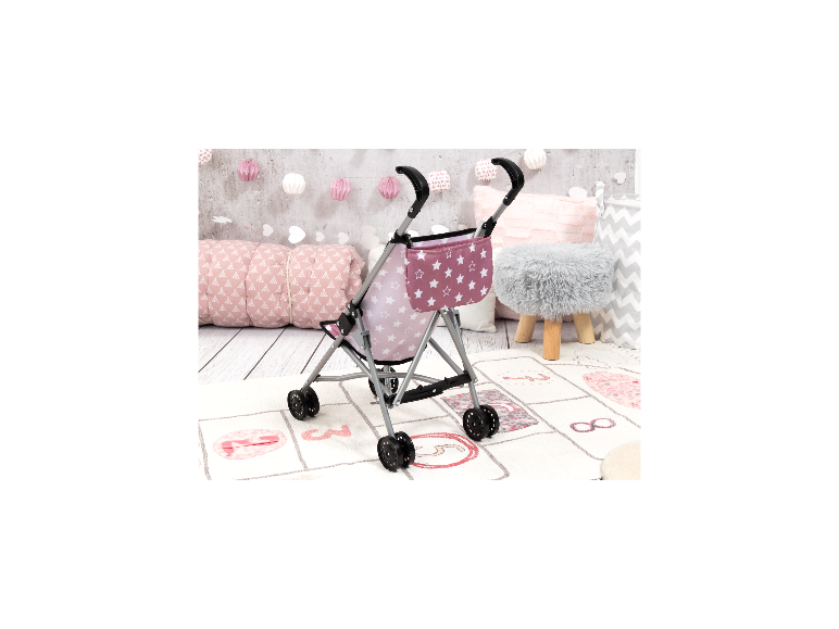 Poussette pour poupée rose avec motif d'étoiles et sac assorti.