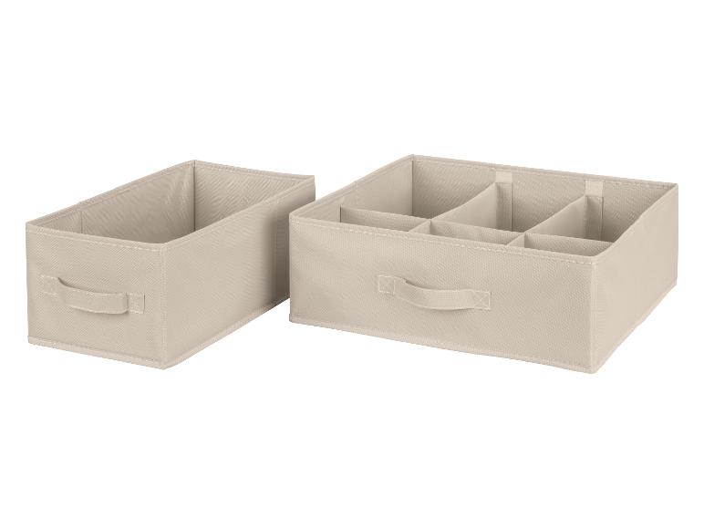 Deux boîtes de rangement beiges, l'une avec des compartiments.