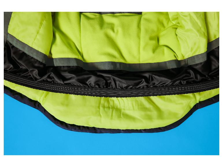 Veste de chien jaune fluo et noire sur fond bleu