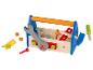 Boîte à outils en bois pour enfants avec clé, marteau et vis.