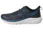 Chaussures de course noires avec des accents bleus de Crivit.