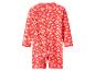 Maillot de bain rouge à manches longues avec motif floral blanc et jaune.