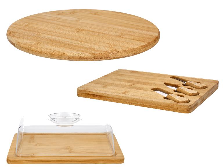 Ensemble de planches à fromage en bambou avec couteaux et couvercle.