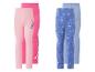 Lot de quatre leggings pour enfants : deux roses avec motif alien et deux bleus avec motif princesse.