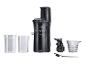 Presse-agrumes SilverCrest noir avec deux pichets et accessoires.