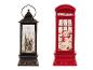 Deux lanternes LED LIVARNO® avec fonction boule à neige : une noire avec le Père Noël, une rouge avec un bonhomme de neige.