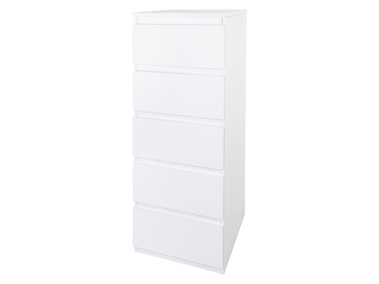 Une commode blanche avec quatre tiroirs.