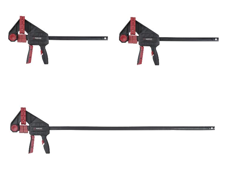 Trois serre-joints de barres noirs et rouges de différentes tailles sur fond blanc.