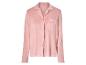 Une chemise en velours rose pour femme.