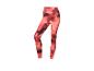Leggings de sport rouges pour femmes avec un imprimé abstrait.
