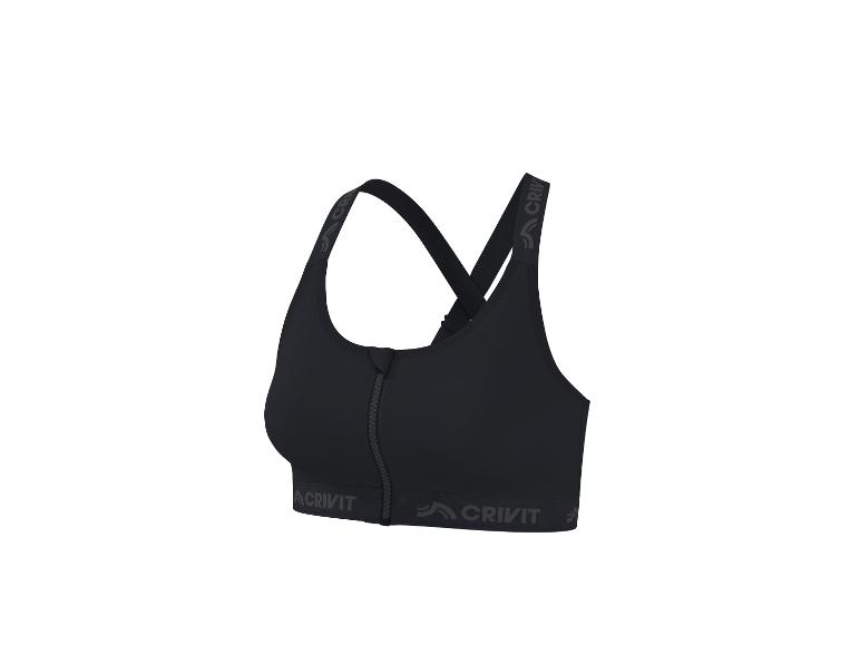 Soutien-gorge de sport noir avec fermeture éclair avant et bretelles croisées.