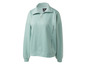 Un sweat-shirt Jette Sport vert clair avec une fermeture éclair.