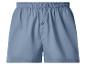 Caleçon boxer homme en coton bleu avec taille élastique et bouton.