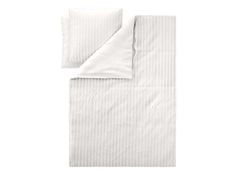 Parure de lit rayée blanche avec taie d'oreiller