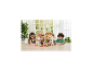 Deux enfants jouent avec une grande maison de poupée et des figurines d'animaux sur une table en bois.
