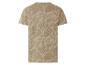 T-shirt beige homme avec imprimé feuilles tropicales.