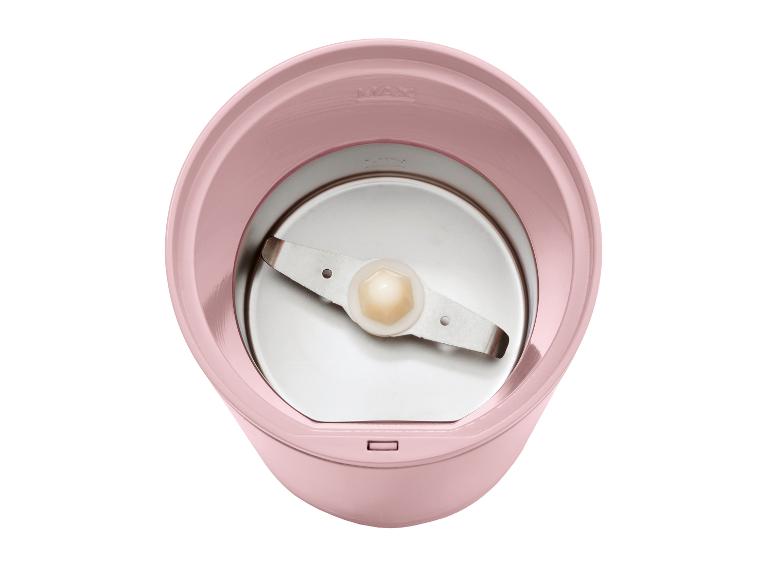 Robot de cuisine rose avec lames.