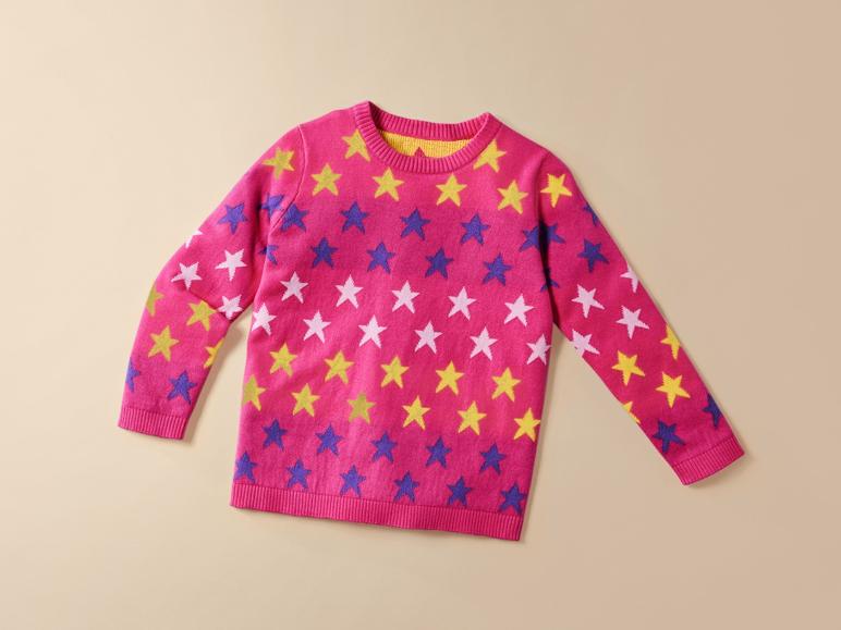 Un pull rose à imprimé d'étoiles pour enfants.