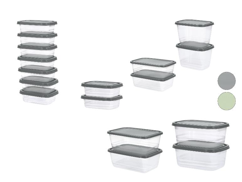 Ensemble de récipients alimentaires en plastique transparent avec couvercles gris, empilés.