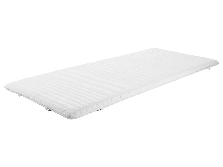 Matelas blanc en mousse, idéal pour lit simple.