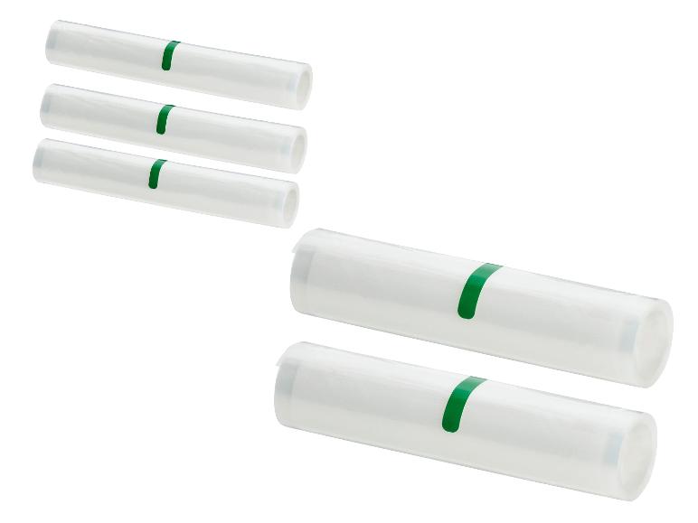 Cinq rouleaux de sacs de mise sous vide transparents avec étiquettes vertes
