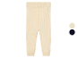 Leggings bébé en tricot beige.