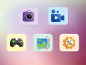 Icônes d'applications : appareil photo, caméra vidéo, manette de jeu, galerie de photos et paramètres.