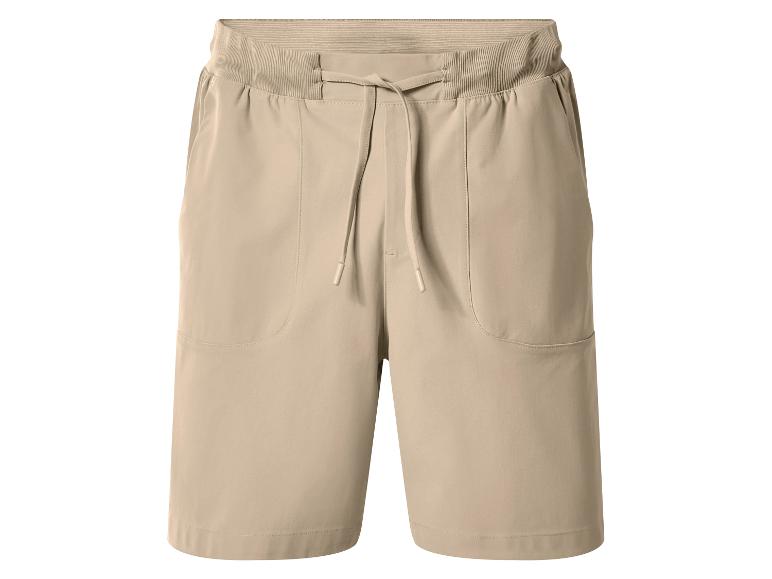 Shorts homme beige avec cordon de serrage et taille élastique.