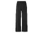 Pantalon noir ample, style élégant.